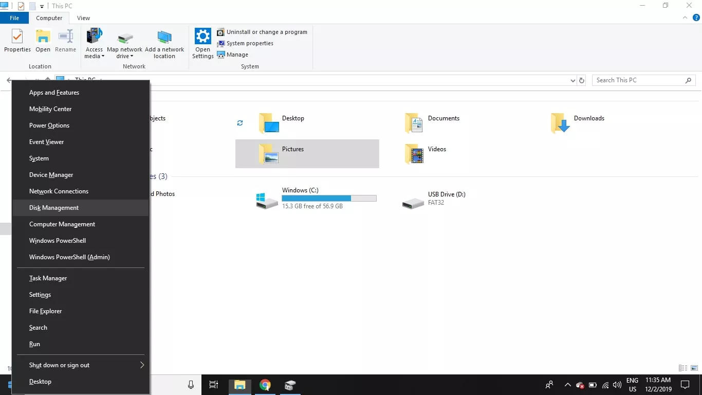 Right-click the Start menu and select Disk Management.